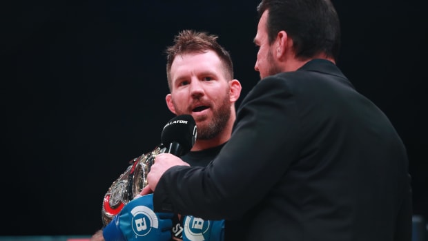 Ryan Bader (blue gloves) defeats Fedor Emelianenko (red gloves) during Bellator 214 at The Forum.